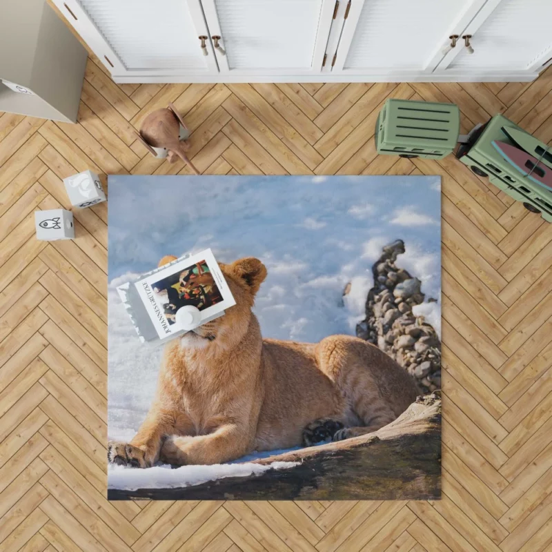 Relaxing Lioness Amidst Snow Rug